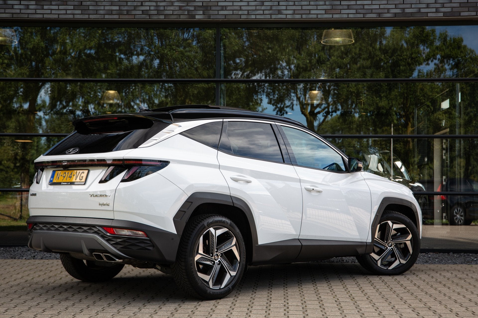 Hyundai Tucson 1.6 T-GDI HEV Premium Sky , Pano, Adap. cruis, Gebruikt, 4 cilinders, 1650 kg, Bedrijf