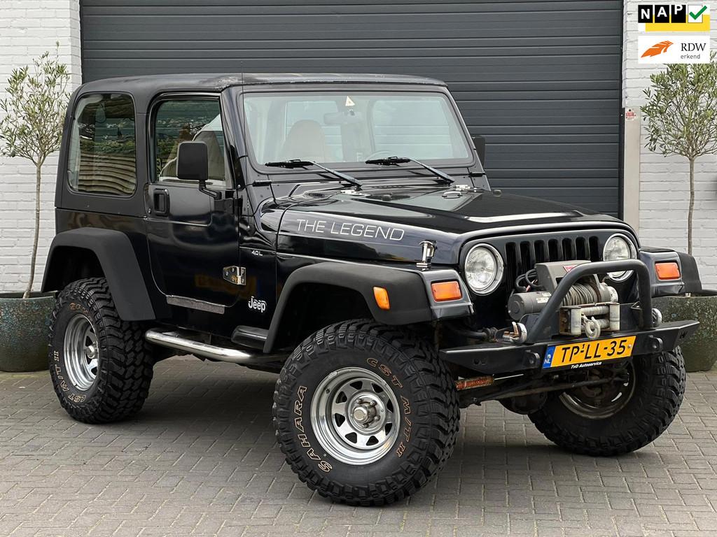 Jeep Wrangler 4.0i Hardtop 4x4 | 89DZ KM | NAP | 2e Eign. |, Auto's, Euro 2, 450 kg, Gebruikt, Beige