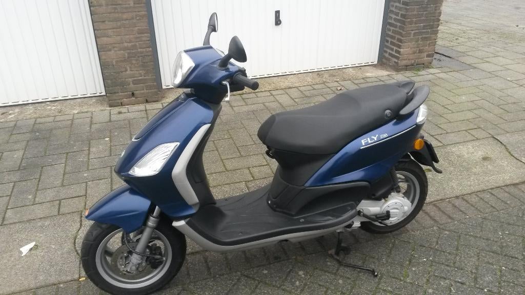 piaggio fly 2010, blauw kenteken, Piaggio, Gebruikt, Ophalen of Verzenden, Benzine