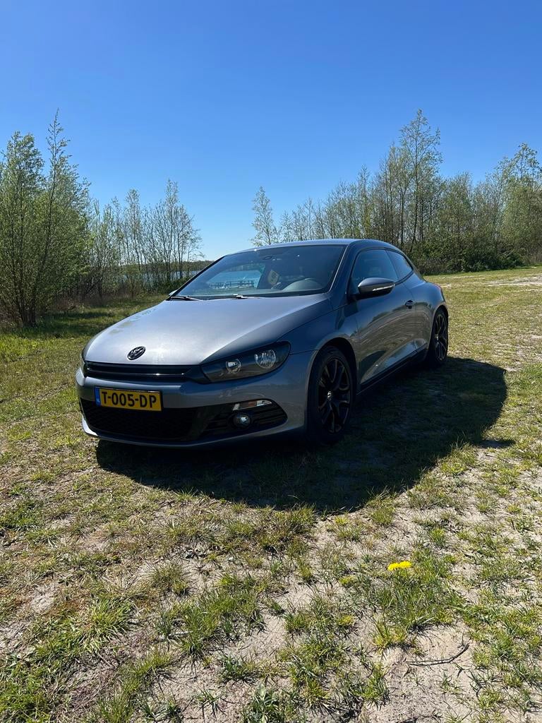 Mooie Volkswagen Scirocco 1.4 TSI 2009 met gereviseerd blok, Voorwielaandrijving, 15 km/l, Zwart, Leder en Stof