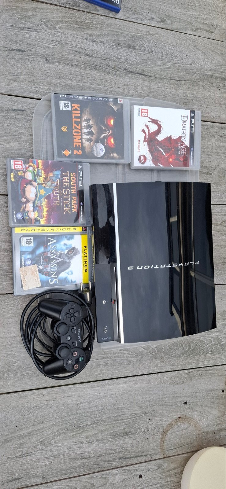 PlayStation 3 met 4 games en controller, Avontuur en Actie, Gebruikt, Vanaf 18 jaar, 1 speler