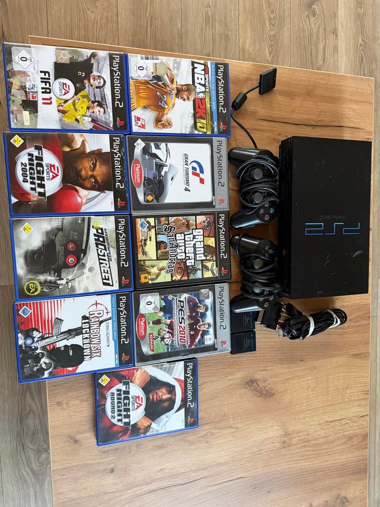Playstation 2 met 9 games en accessoires, Gebruikt, Overige genres, 2 spelers, Eén computer