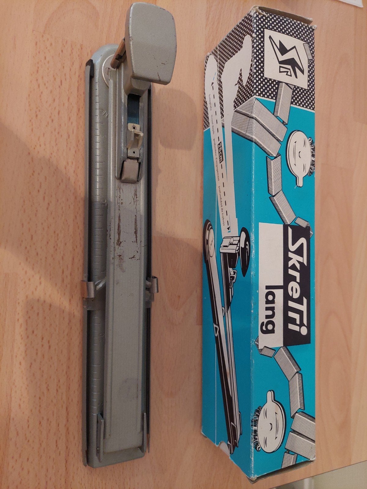 Lange nietmachine, Ophalen, Koper of Messing, Slot