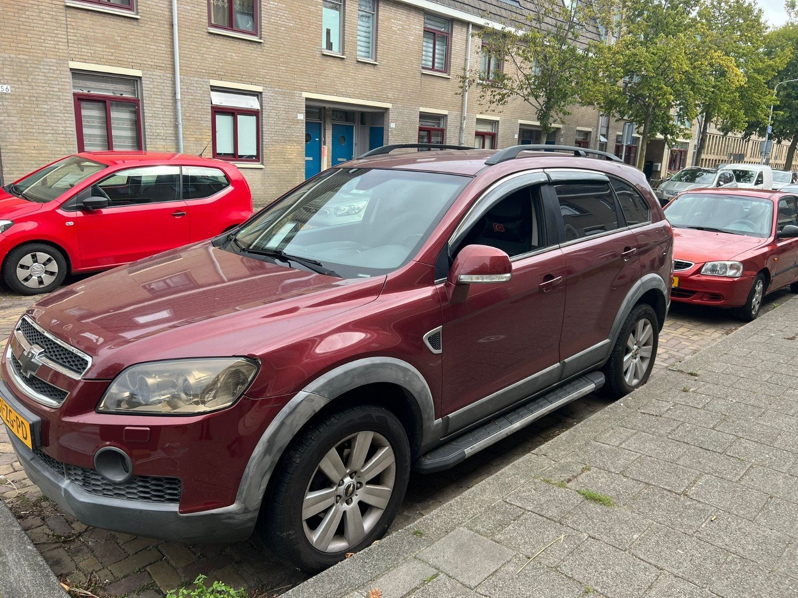 Chevrolet Captiva 3.2 4WD AUT 2008 met 260 pk Rood, Auto's, 3195 cc, Zwart, 2000 kg, Vierwielaandrijving