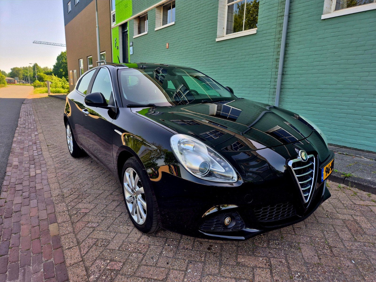 Alfa Romeo Giulietta 1.4 Turbo  2010 Zwart nap airco cruise, Auto's, Voorwielaandrijving, Stof, Zwart, 4 cilinders
