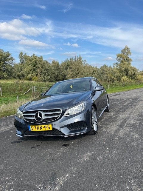 Mercedes-Benz E-Klasse E200 2.0 135KW Aut7 2014 Grijs, Auto's, Achterwielaandrijving, 4 cilinders, Leder en Stof, Origineel Nederlands