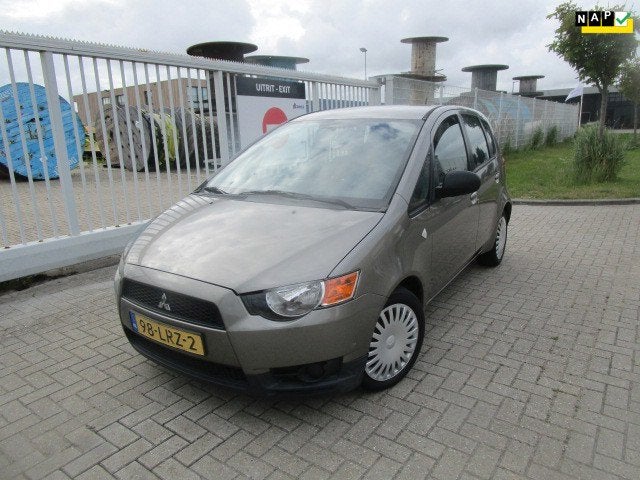 Mitsubishi Colt 1.1 Edition One, Gebruikt, Metallic lak, Colt, Origineel Nederlands