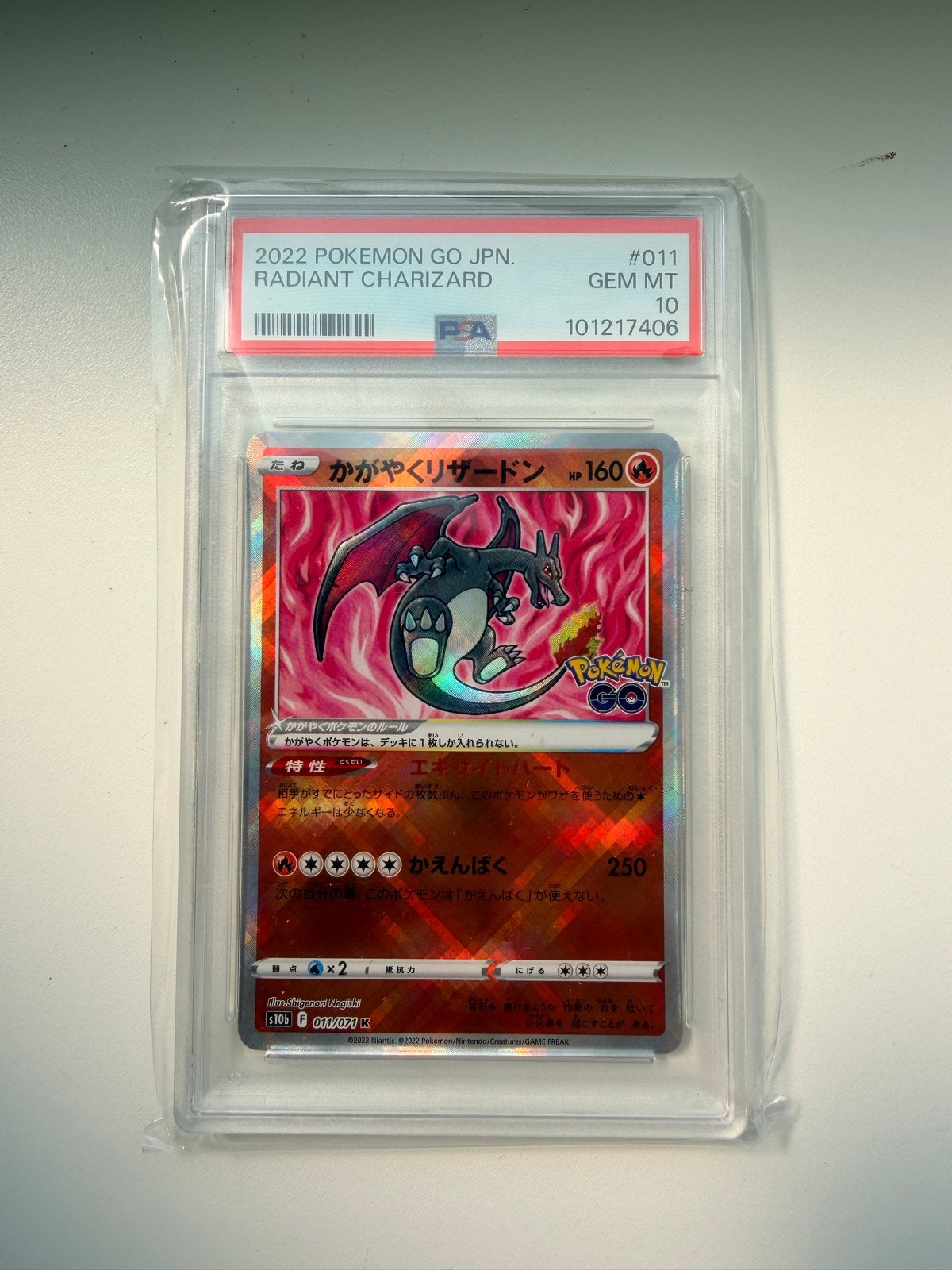 Japanse Radiant Charizard 011 PSA 10, Hobby en Vrije tijd, Verzamelkaartspellen | Pokémon, Ophalen of Verzenden, Nieuw, Losse kaart