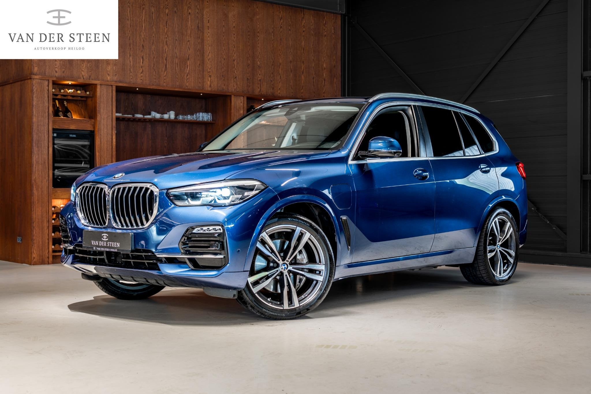 BMW X5 xDrive45e High Executive Pano | Memory | Luchtvering, Auto's, Gebruikt, 394 pk, Blauw, Vierwielaandrijving