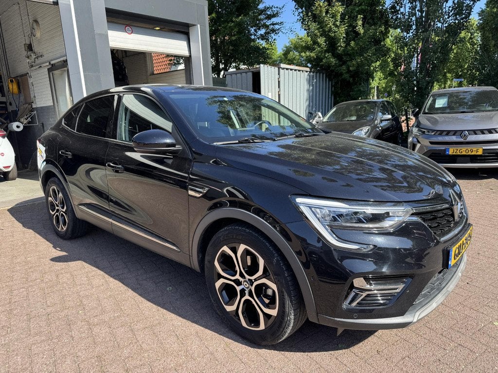 Renault Arkana 1.6 E-Tech hybrid 145 Techno+Pack Solid!, Arkana, Gebruikt, Euro 6, Leder en Stof