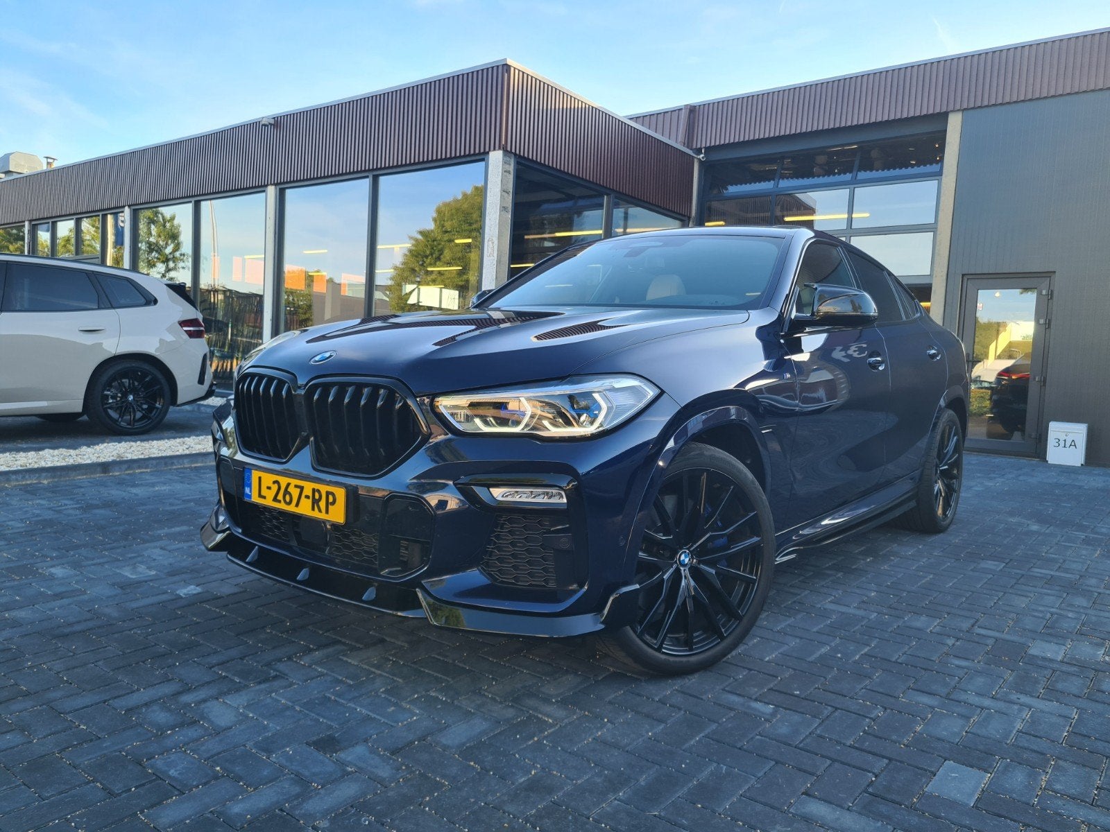 BMW X6 Xdrive40i 340pk Aut 2020 M Sport Tanzanit Blauw Lazer, Auto's, Automaat, Euro 6, Blauw, 340 pk