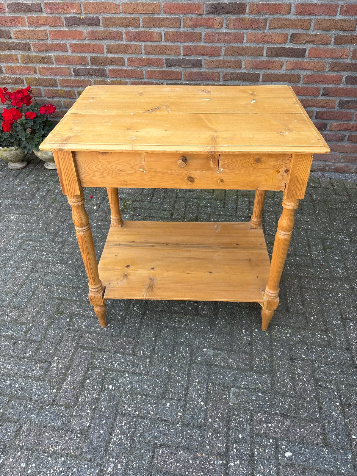 Grenen tafeltje., Ophalen
