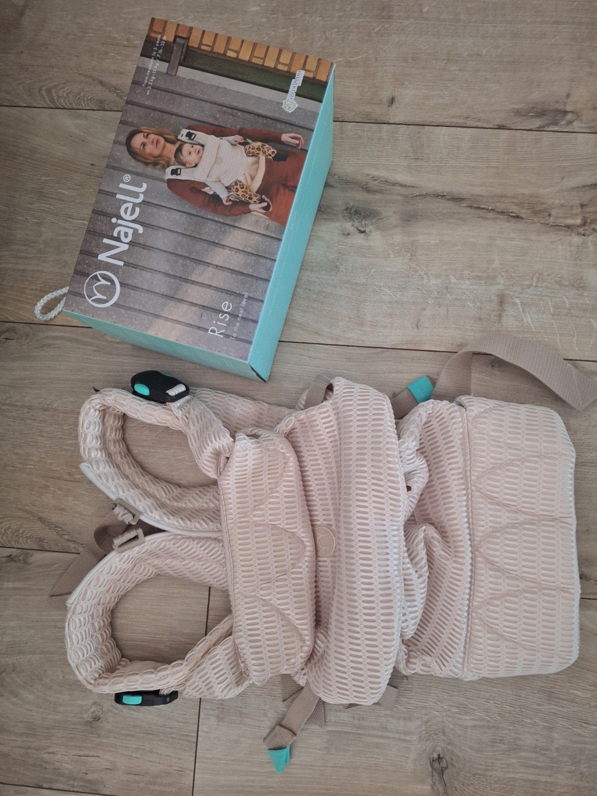 Najell Draagzak - Zo goed als nieuw met doos en boekje, Kinderen en Baby's, Ophalen of Verzenden, Zo goed als nieuw, Draagzak