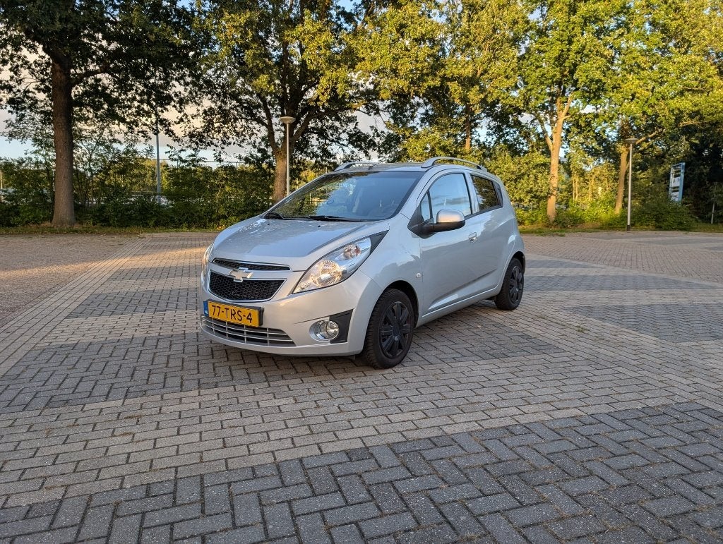 Chevrolet Spark 1.0 benzine 2012 Grijs lage KM NAP!, Auto's, Voorwielaandrijving, 839 kg, Automatische klimaatregeling, 4 cilinders