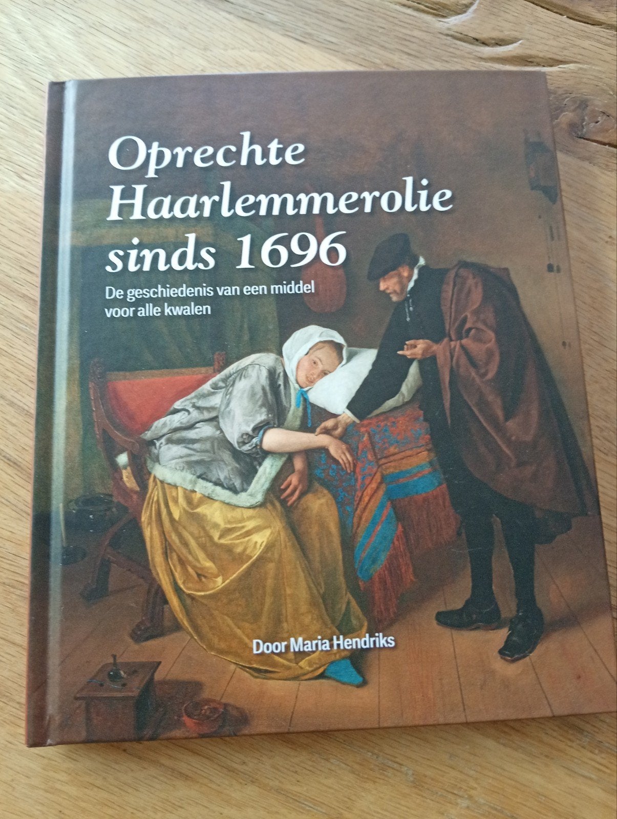 Oprechte Haarlemmerolie sinds 1696 - Geschiedenis, Ophalen of Verzenden, Zo goed als nieuw, Maria Hendriks