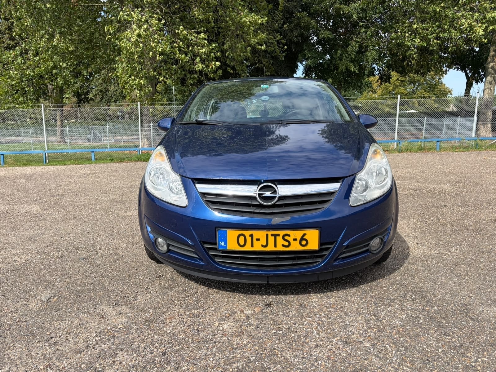Opel Corsa 1.2 16V 3D WR 2009 Blauw, Auto's, Voorwielaandrijving, 450 kg, 40 €/maand, Blauw