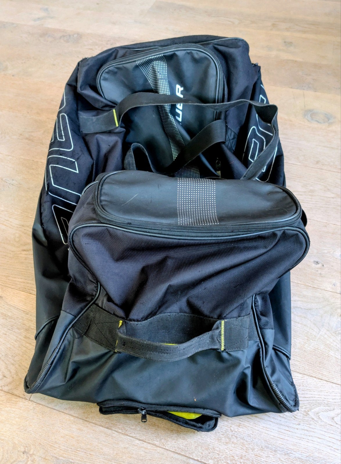 Ijshockeytas Bauer Junior met wieltjes, Wieltjes, 30 cm of meer, Gebruikt, Zwart