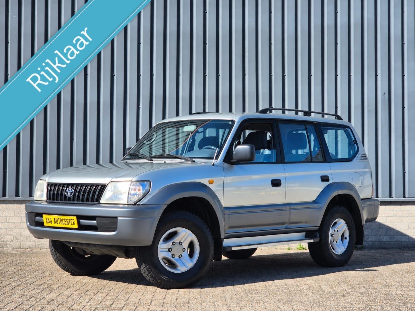 Toyota LandCruiser 90 3.4i V6/1e Eig/Deal Ond/178PK/Trekhaak, Auto's, Dealer onderhouden, Stof, Gebruikt, Bedrijf