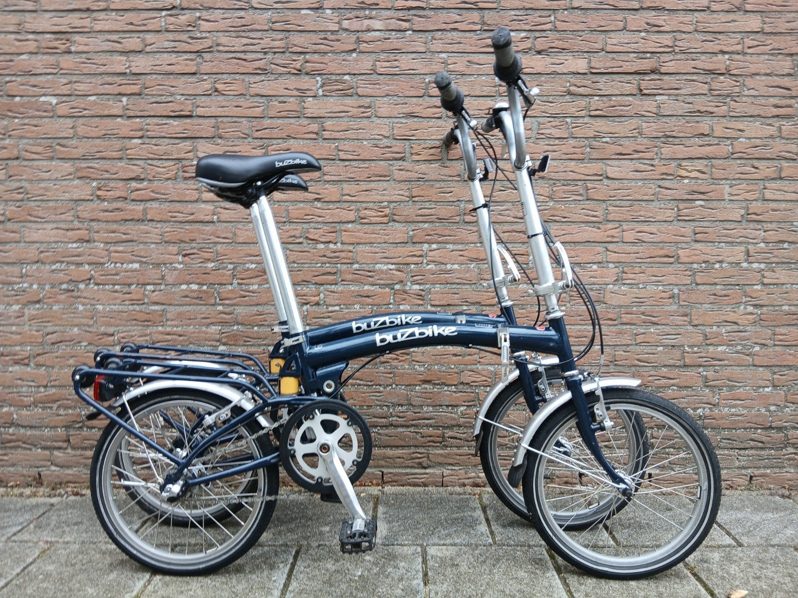 Gebruikte, goedwerkende BuzBike vouwfietsen set., Fietsen en Brommers, Fietsen | Vouwfietsen, Ophalen, Totaal opvouwbaar, Versnellingen