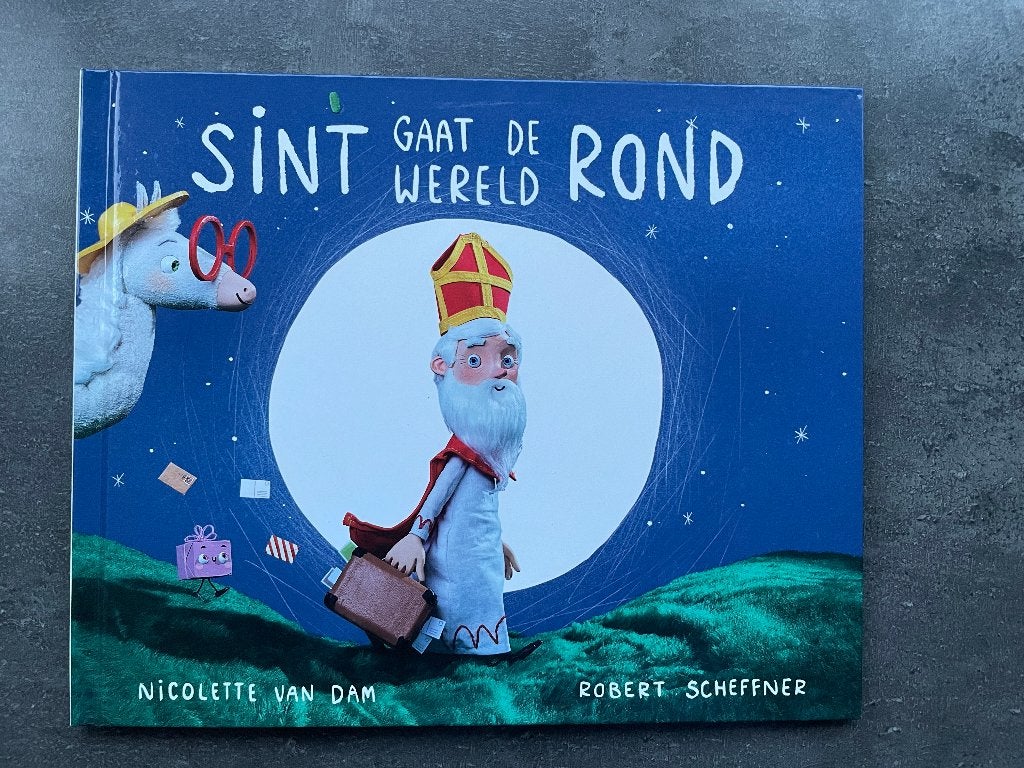 Sint gaat de wereld rond Nicolette van Dam en R. Scheffner, Ophalen, Gelezen, Fictie algemeen