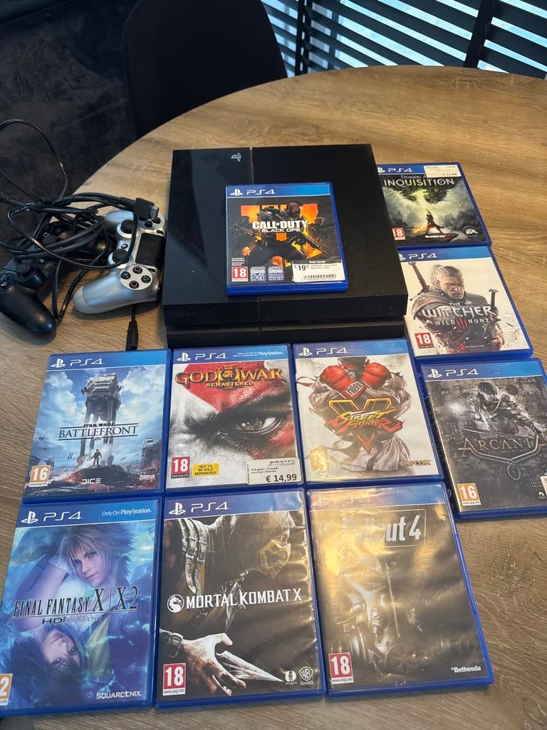 PlayStation 4 PS4 met 2 controllers en 10 games, Ophalen of Verzenden, Zo goed als nieuw, Met 2 controllers
