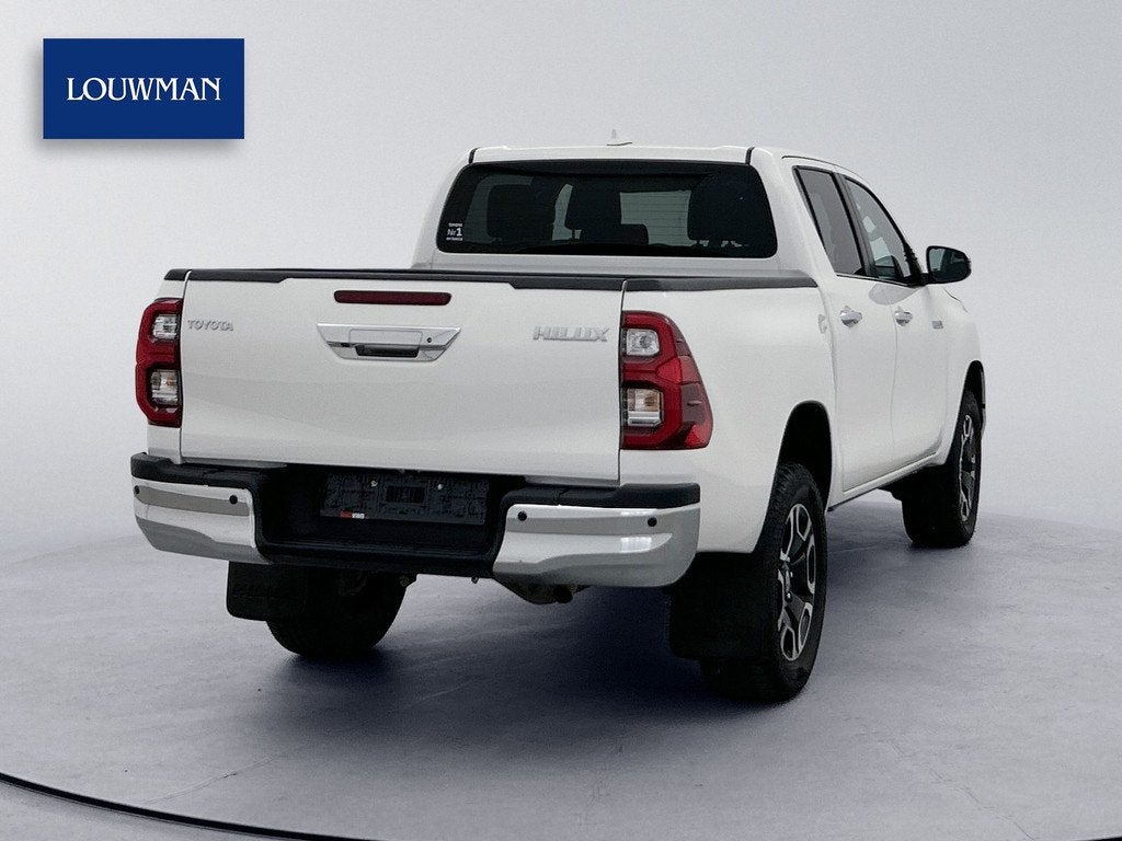 Toyota Hilux 2.8 D-4D Double Cab Professional 204pk Led Navi, Auto's, Stof, Gebruikt, Zwart, 4 cilinders