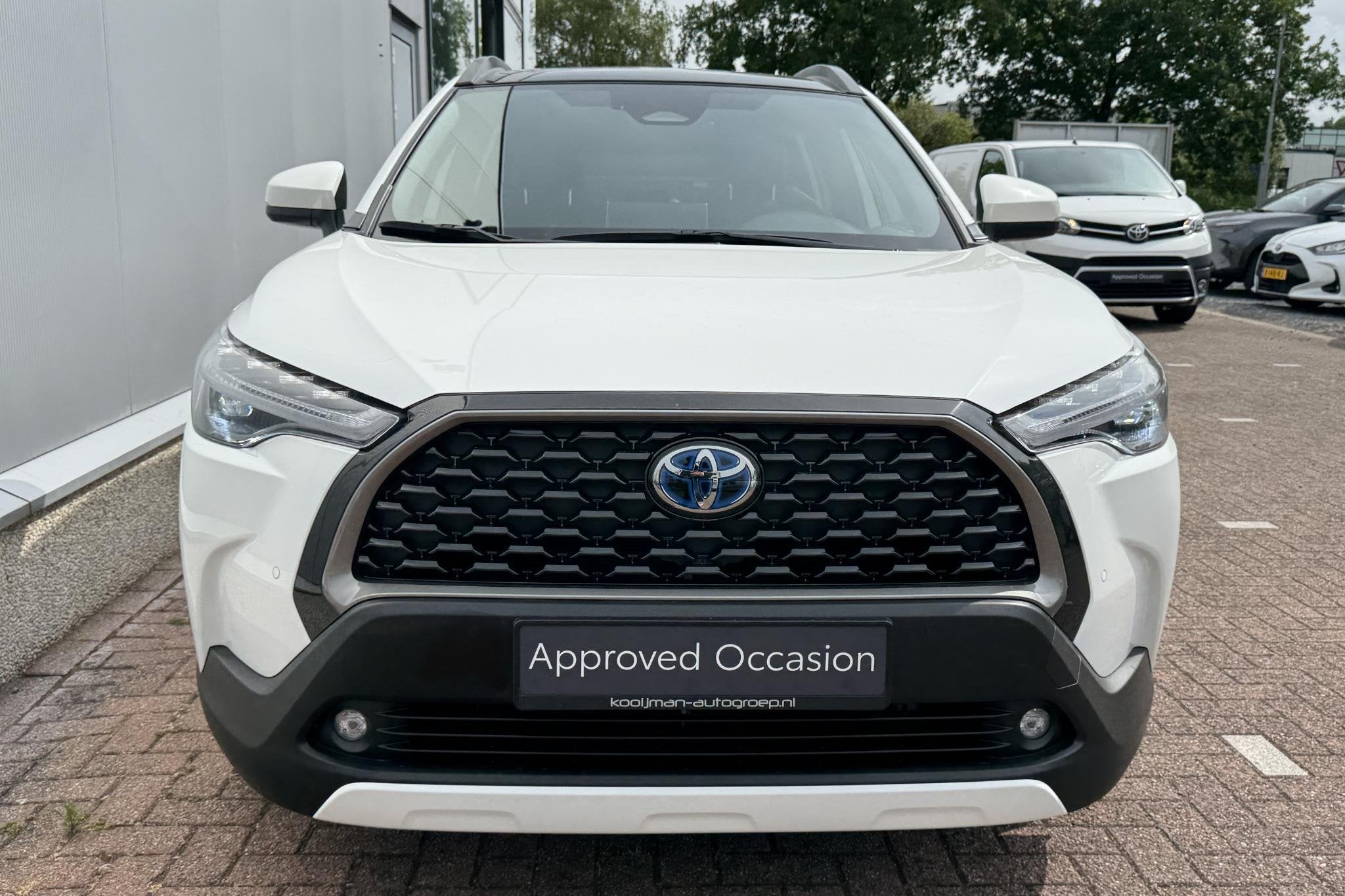 Toyota Corolla Cross Hybrid 140 Premium Pack II / Panoramada, Auto's, Gebruikt, 4 cilinders, Leder en Stof, Wit