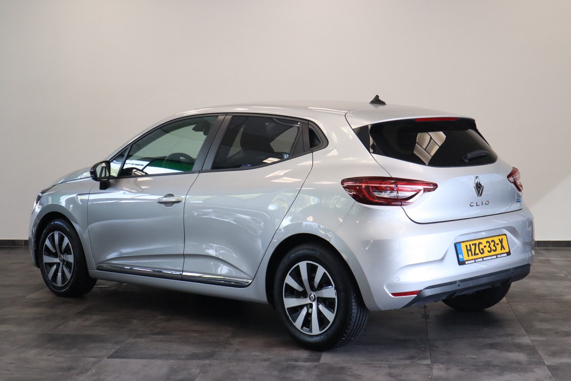 Renault Clio 1.6 E-Tech Hybrid 145 Evolution Navigatie Full-, Auto's, Stof, Gebruikt, 4 cilinders, Met garantie (alle)