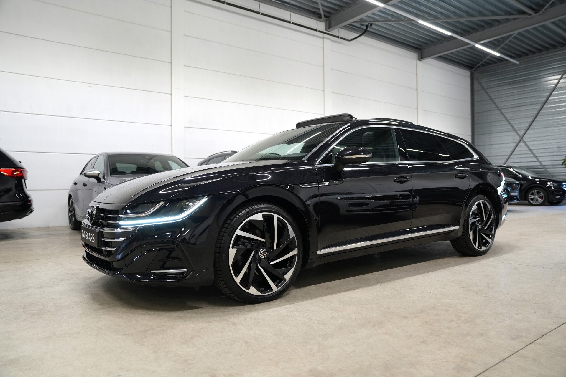 Volkswagen Arteon Shooting Brake 2.0 TSI R-Line * Kuipstoele, Auto's, Volkswagen, Arteon, Zwart, Stationwagon, 17 km/l