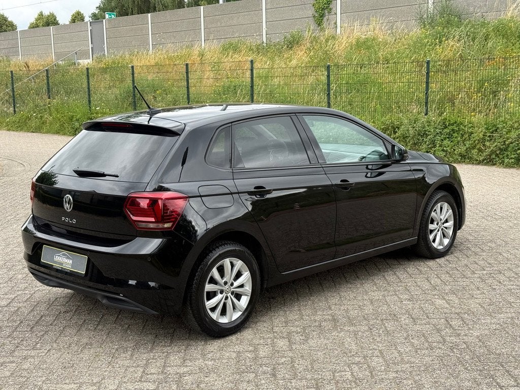Volkswagen Polo 1.0 TSI Highline DSG I NAVI I CARPLAY I EERS, Gebruikt, Automatische klimaatregeling, 116 pk, Zwart