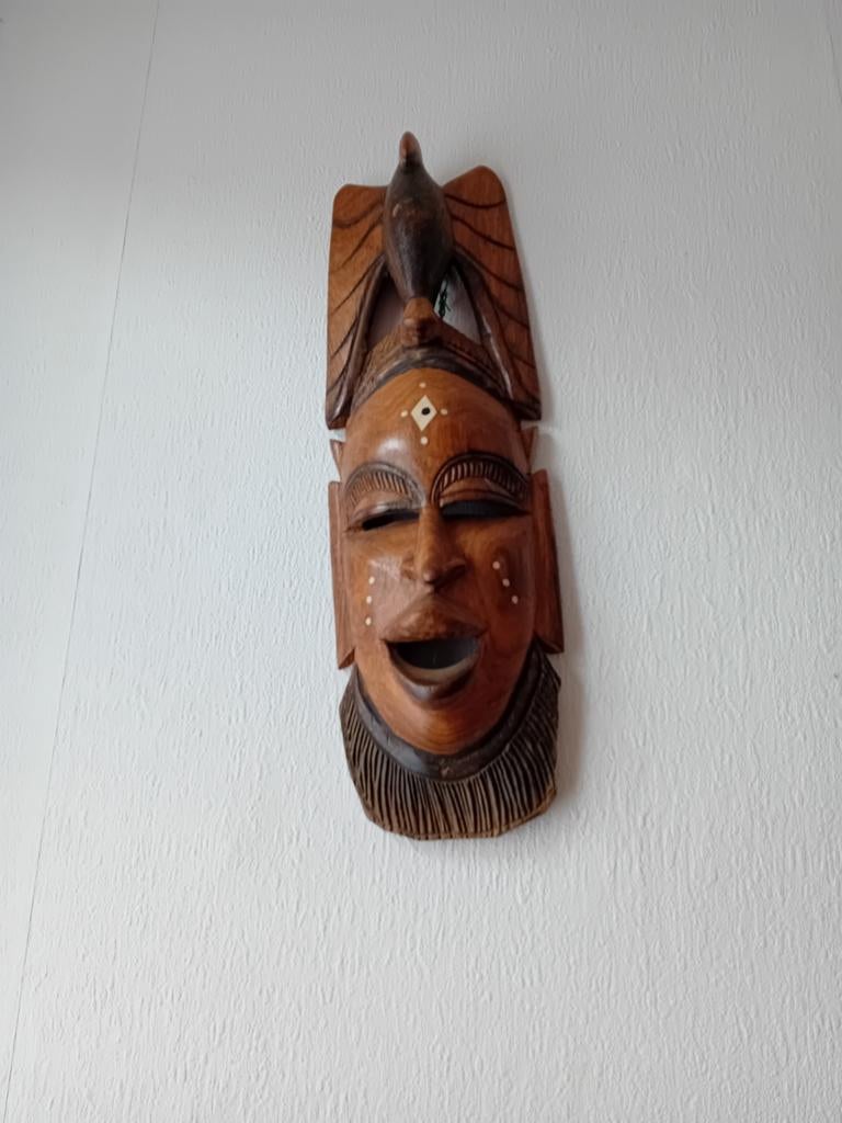 Afrikaans masker hout, Ophalen