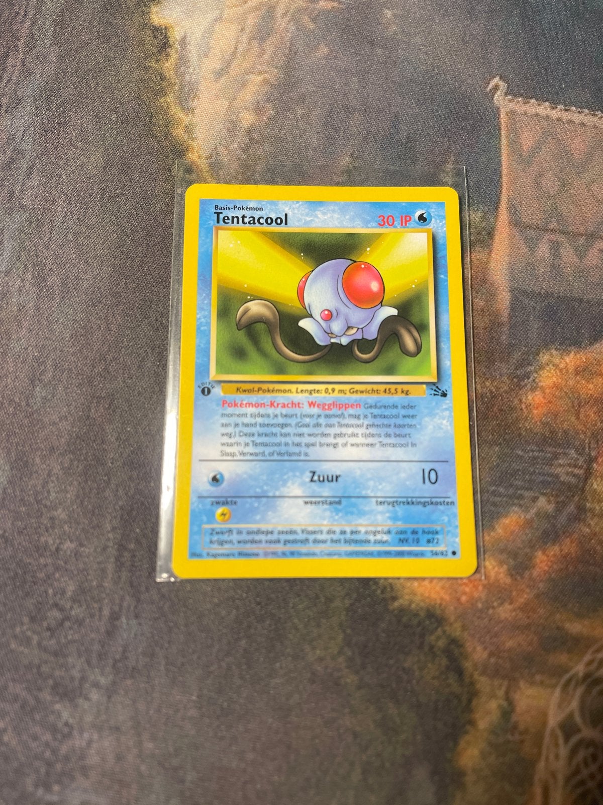 Tentacool 56/62 NM Fossil 1st Edition Pokémon Kaart Nederlan, Ophalen of Verzenden, Zo goed als nieuw, Losse kaart
