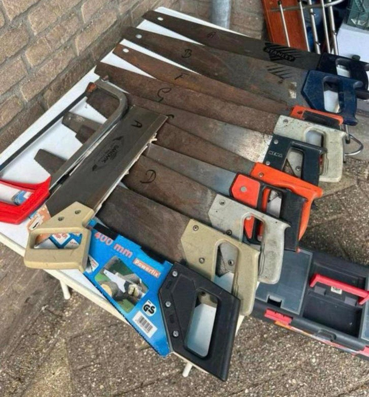 Lotje van 10 hand hout zagen + een ijzer zaag + een kapzaag, Ophalen of Verzenden, Gebruikt