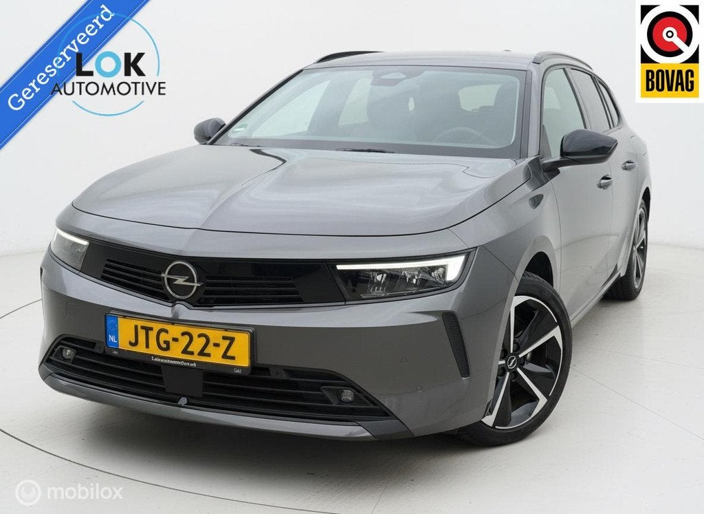 Opel Astra Sports Tourer 1.6 Turbo Plug In Hybrid Edition, Auto's, Stof, Gebruikt, Euro 6, 4 cilinders