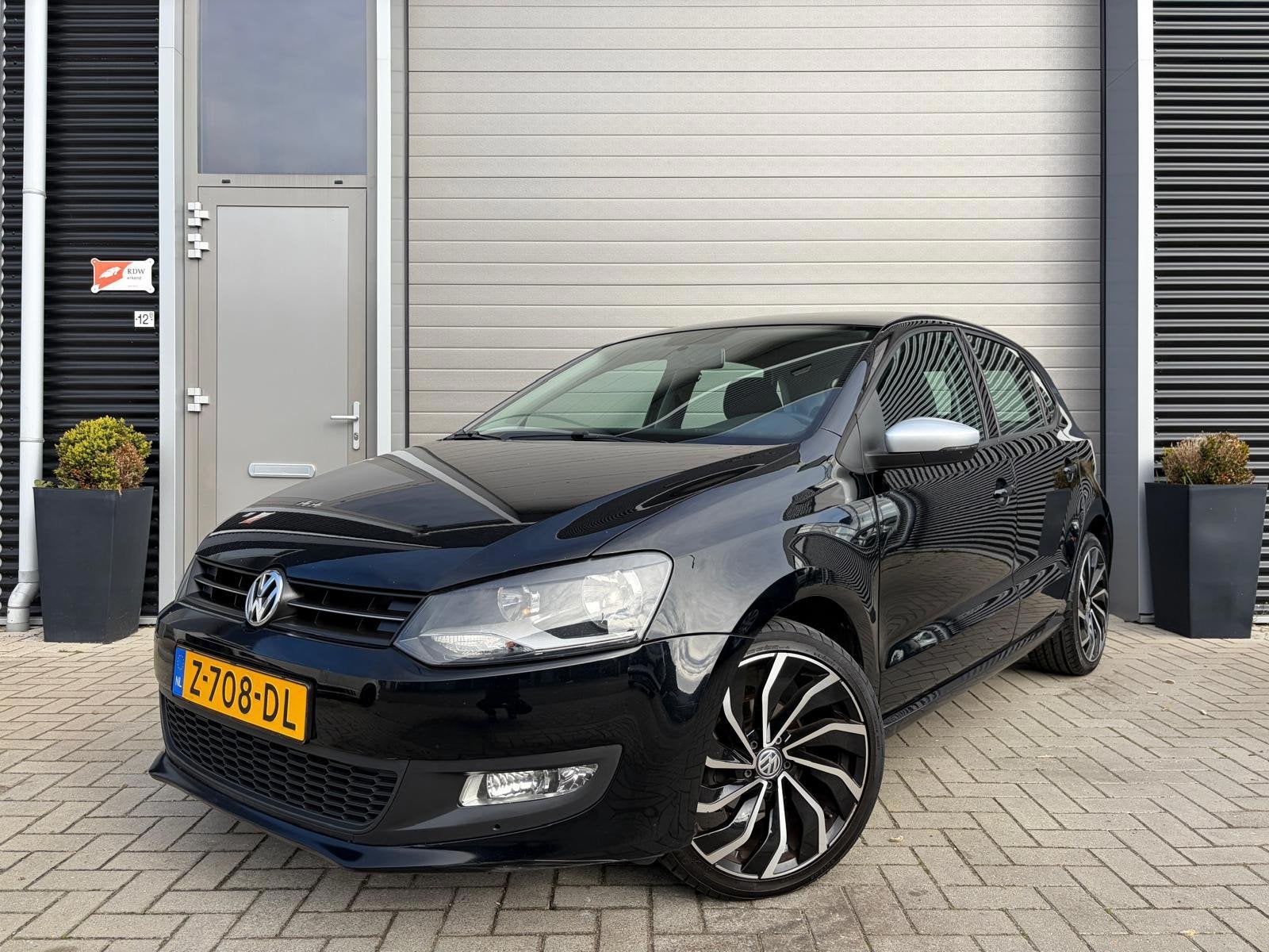 Volkswagen Polo 1.4-16V Comfortline/Lichtmetaal/Carplay/Airc, Auto's, Volkswagen, Voorwielaandrijving, Zwart, 4 cilinders, Zwart