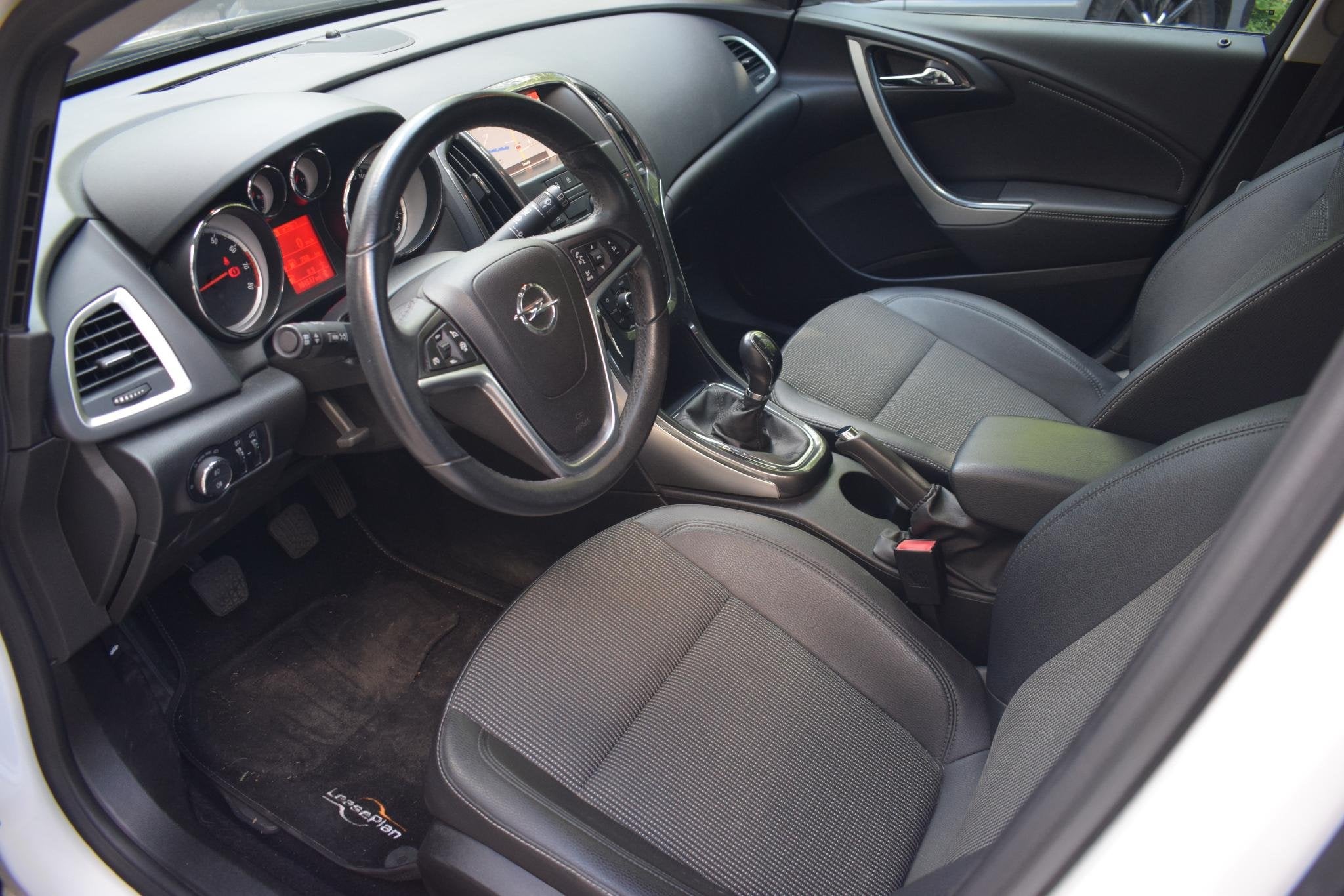 Opel Astra 1.4 Turbo Sport met NAVIGATIE|BLUETOOTH TEL|PDC|, Auto's, Voorwielaandrijving, Stof, Gebruikt, 4 cilinders