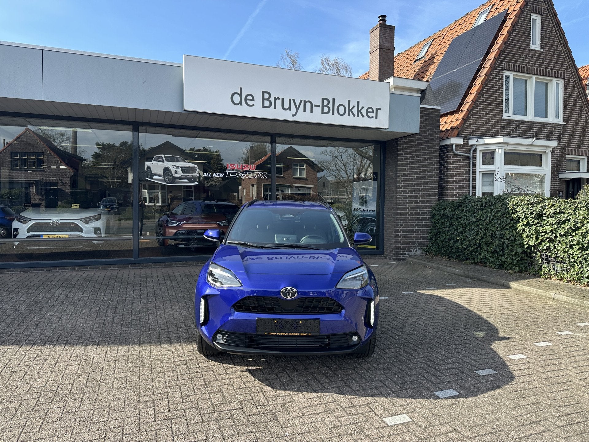Toyota Yaris Cross 1.5 Hybrid 115 Dynamic Apple Carplay / An, 12 maanden, Gebruikt, Zwart, Blauw