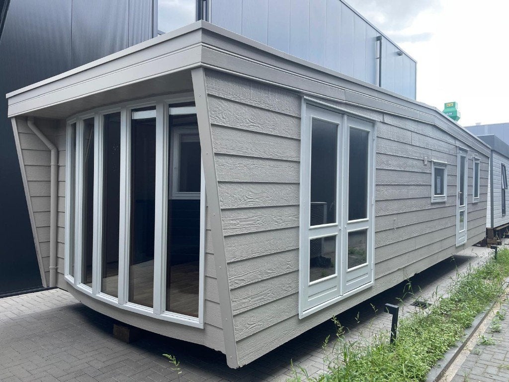 CHALET MET 2 SLAAPKAMERS - OK220, Caravans en Kamperen, Stacaravans, Tot en met 2