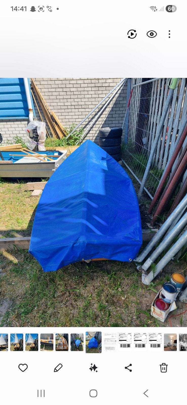 Mooi en goed onderhouden roei-/zeilboot, Ophalen