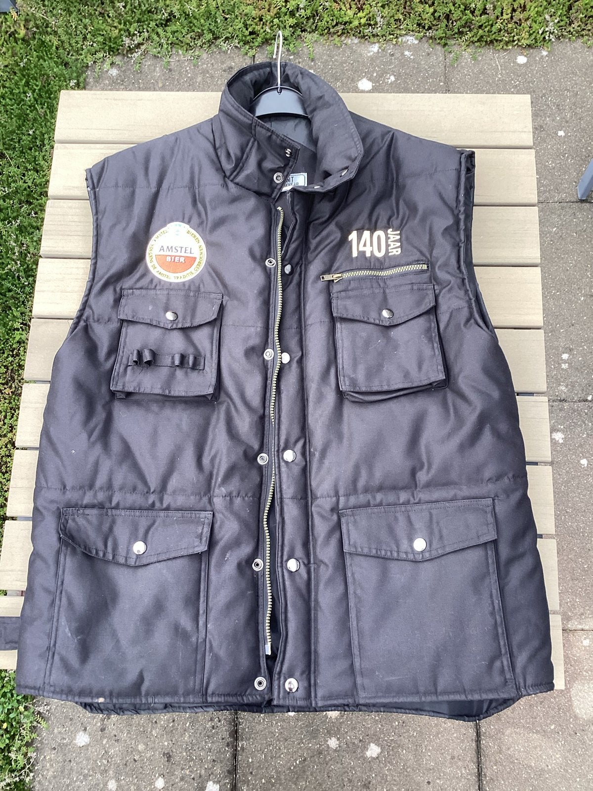 Amstel Bier Bodywarmer - Zwart, Zo goed als nieuw, Ophalen, Zo goed als nieuw, Maat 56/58 (XL), Zwart