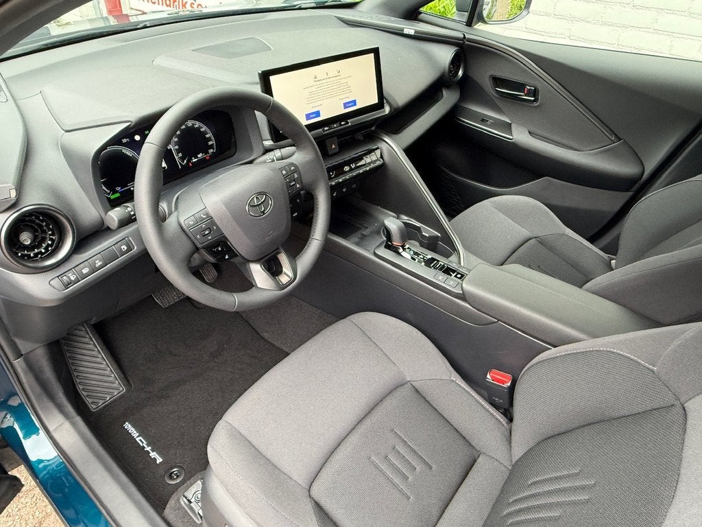 Toyota C-Hr 2.0 High Power PHEV 223pk CVT Dynamic/ Blauw met, Auto's, Toyota, Stof, Zwart, 4 cilinders, Blauw