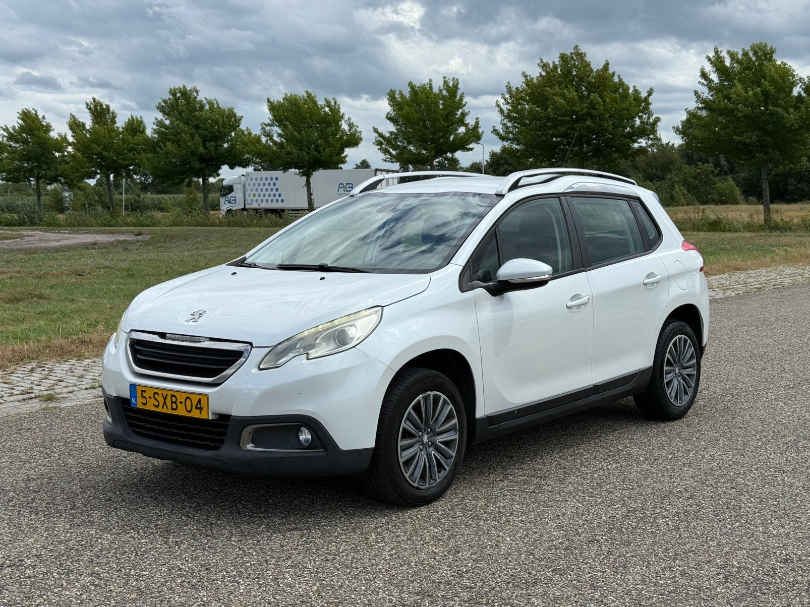 Peugeot 2008 1.2 VTi Blue Lease 2013 AIRCO|PDC|NAVI|, Auto's, Voorwielaandrijving, 40 €/maand, 1199 cc, Wit