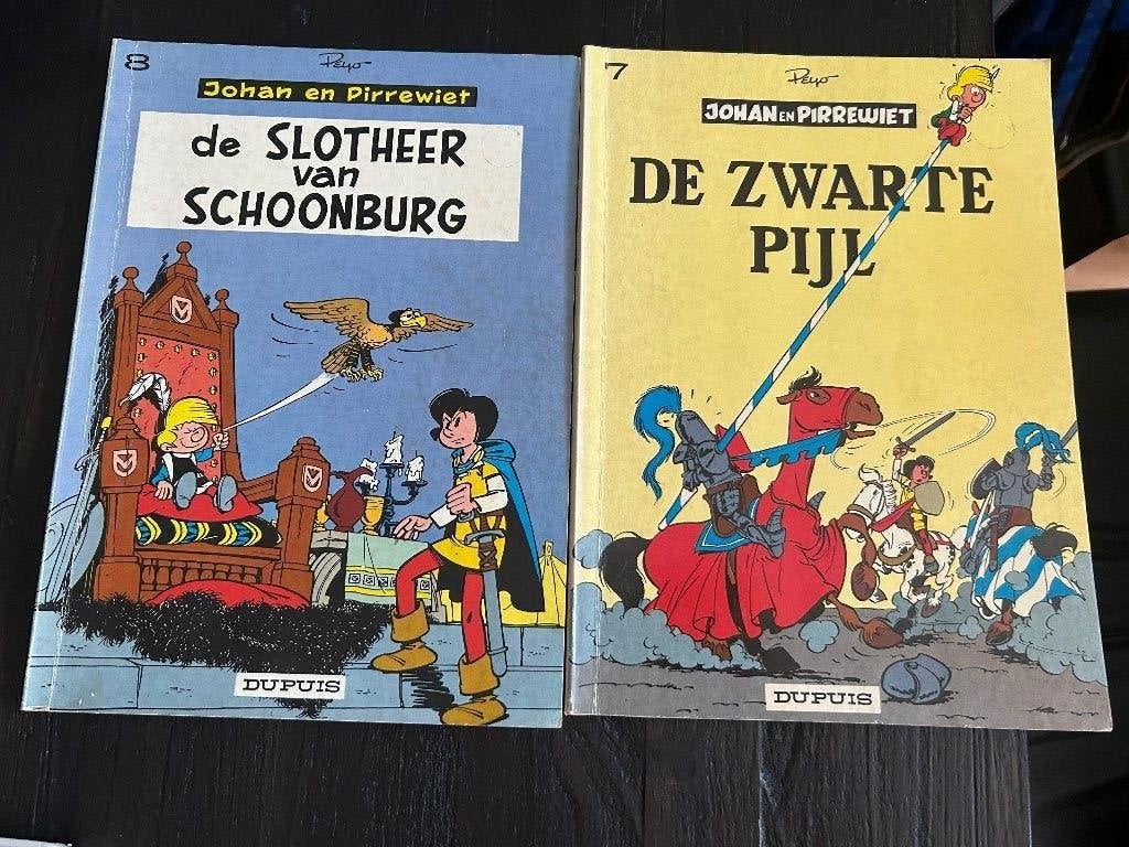 Stripboeken johan en pirrewiet deel 7 en 8 zwarte pijl en, Gelezen, Peyo, Eén stripboek, Ophalen of Verzenden