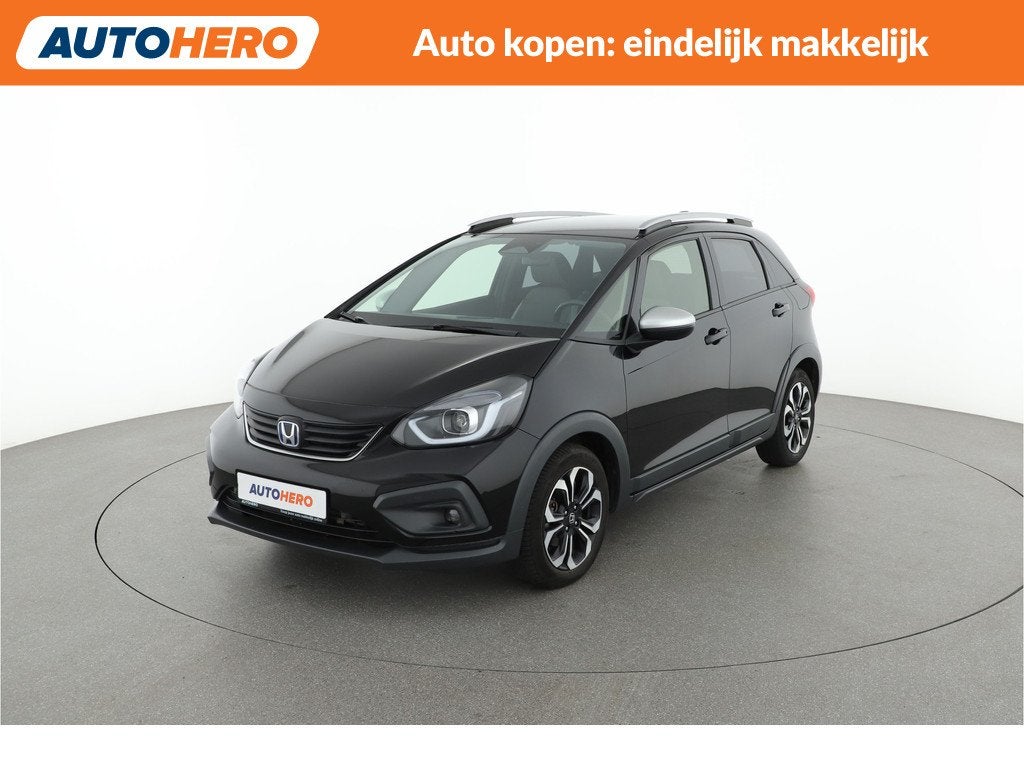 Honda Jazz 1.5 e:HEV Crosstar |FG52127| (bj 2021, automaat), Stof, 4 cilinders, Met garantie (alle), Zwart