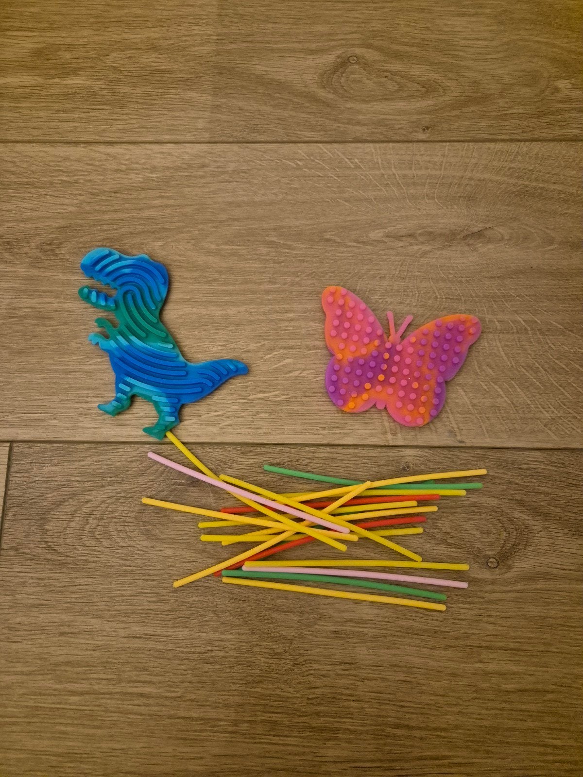 Sensorische fidget set: Dinosaurus, vlinder en stokjes, Kinderen en Baby's, Ophalen of Verzenden, Nieuw, Ontdekken