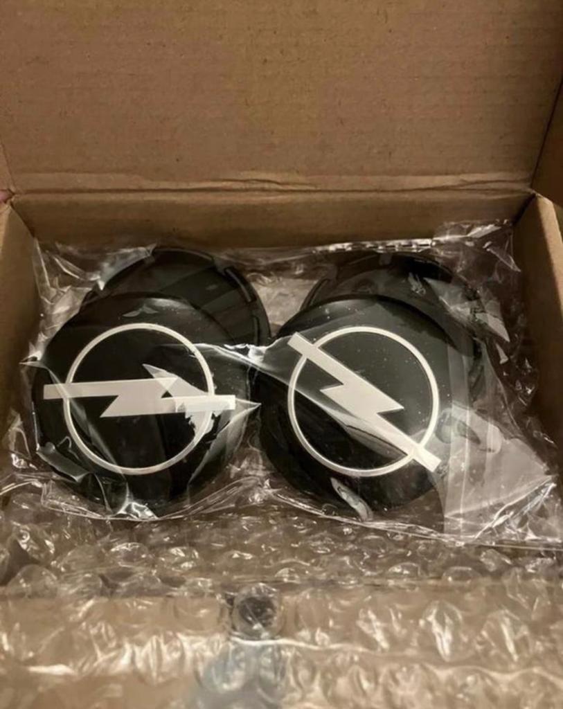 Opel naafkappen 56mm zwart Past op de meeste opel modellen, Ophalen of Verzenden, Nieuw