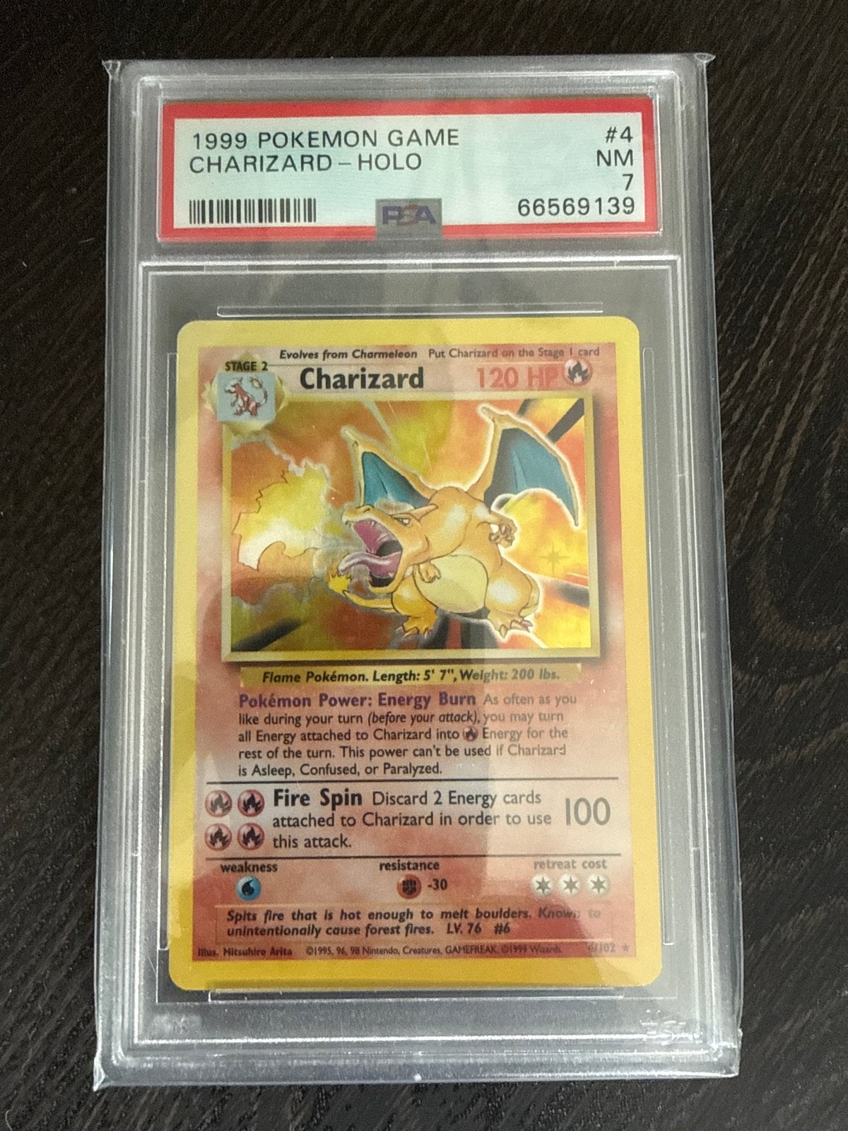 PSA 7 Charizard Holo 1999 Pokémon Game #4, Ophalen of Verzenden, Zo goed als nieuw, Losse kaart