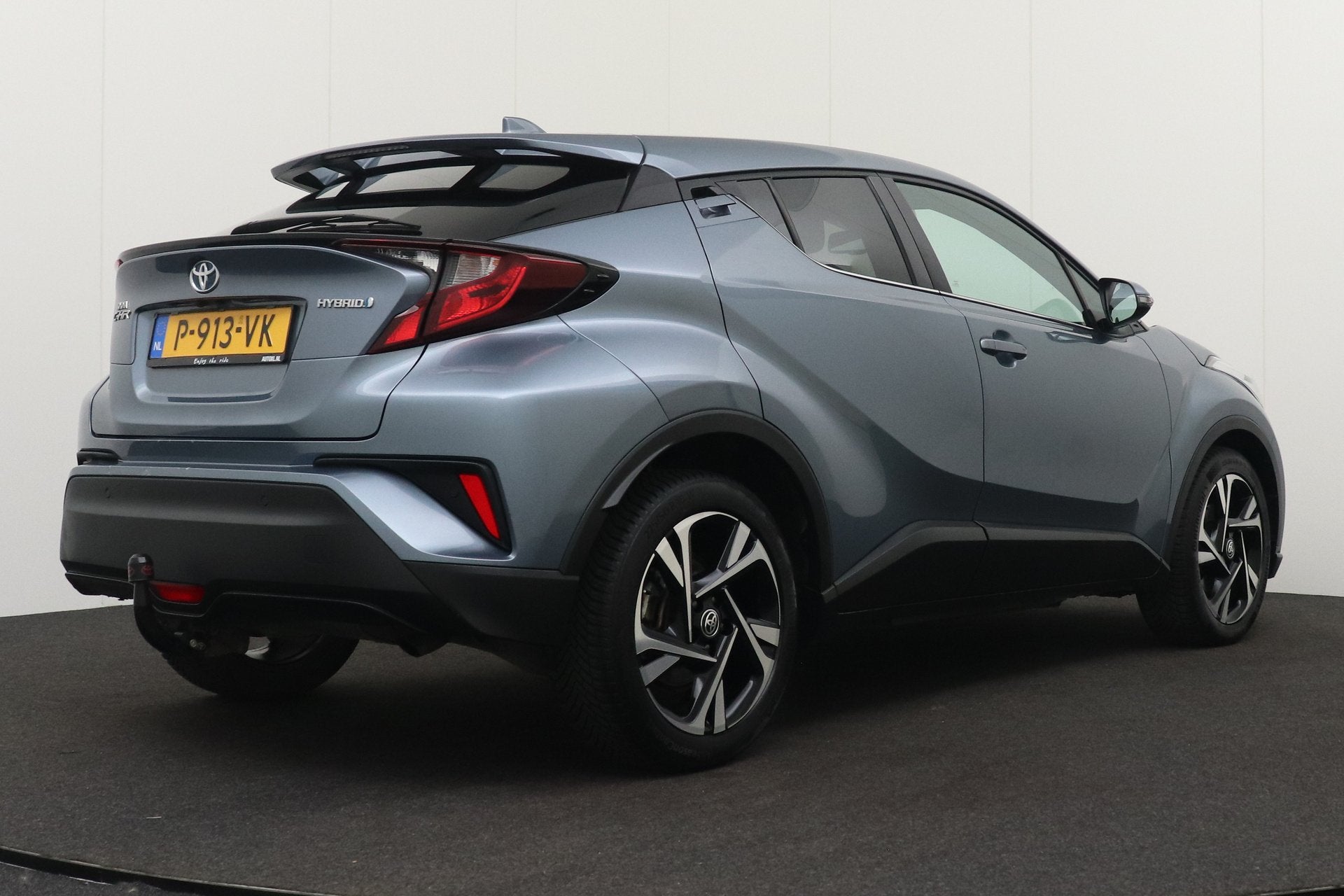 Toyota C-HR 1.8 Hybrid Style Half-Leder Camera Dodehoek Trek, Auto's, Dealer onderhouden, 4 cilinders, Leder en Stof, Origineel Nederlands