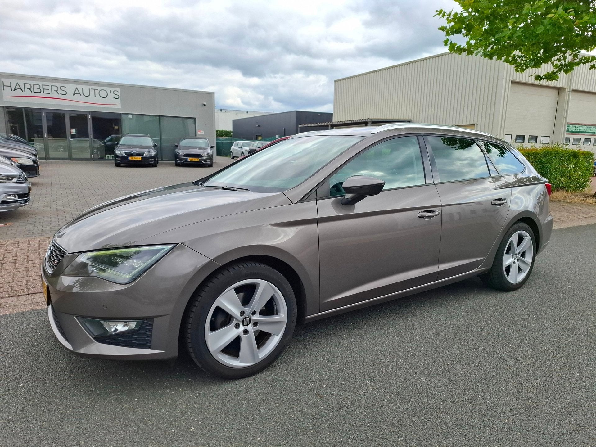 Seat Leon ST 1.4 EcoTSI FR Connect CLIMA/CRUISE/NAVI/CAMERA!, Auto's, Lichtsensor, Gebruikt, 4 cilinders, 150 pk