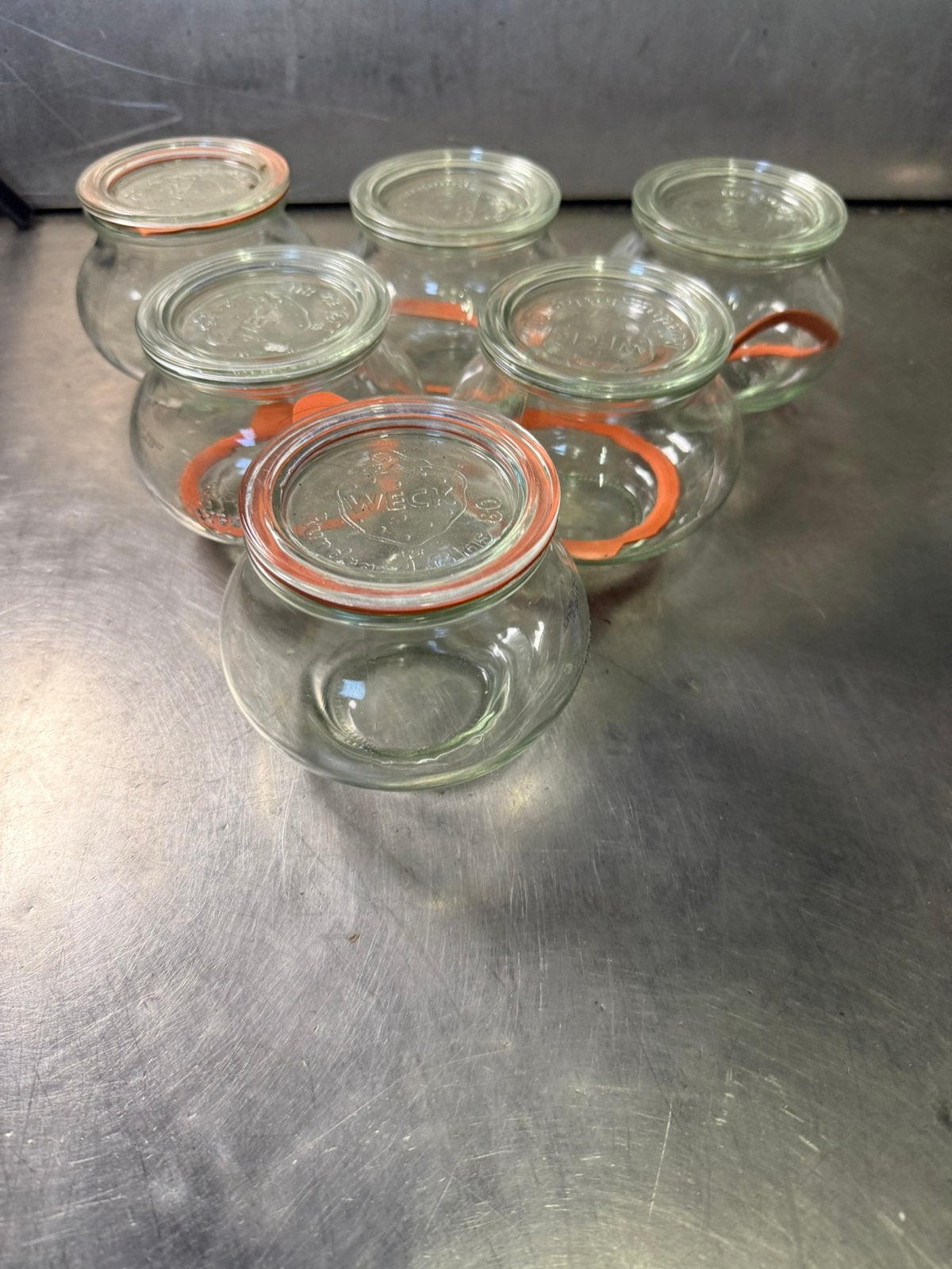 6 weckpotten, Ophalen